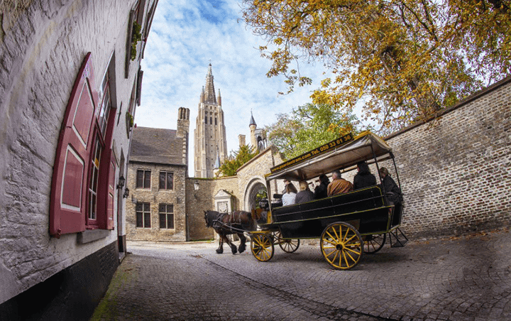 Paardentram in centrum Brugge in combinatie met kookworkshop